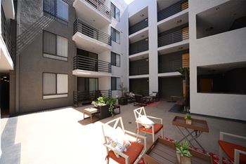 Indie Westside main floor courtyard chairs